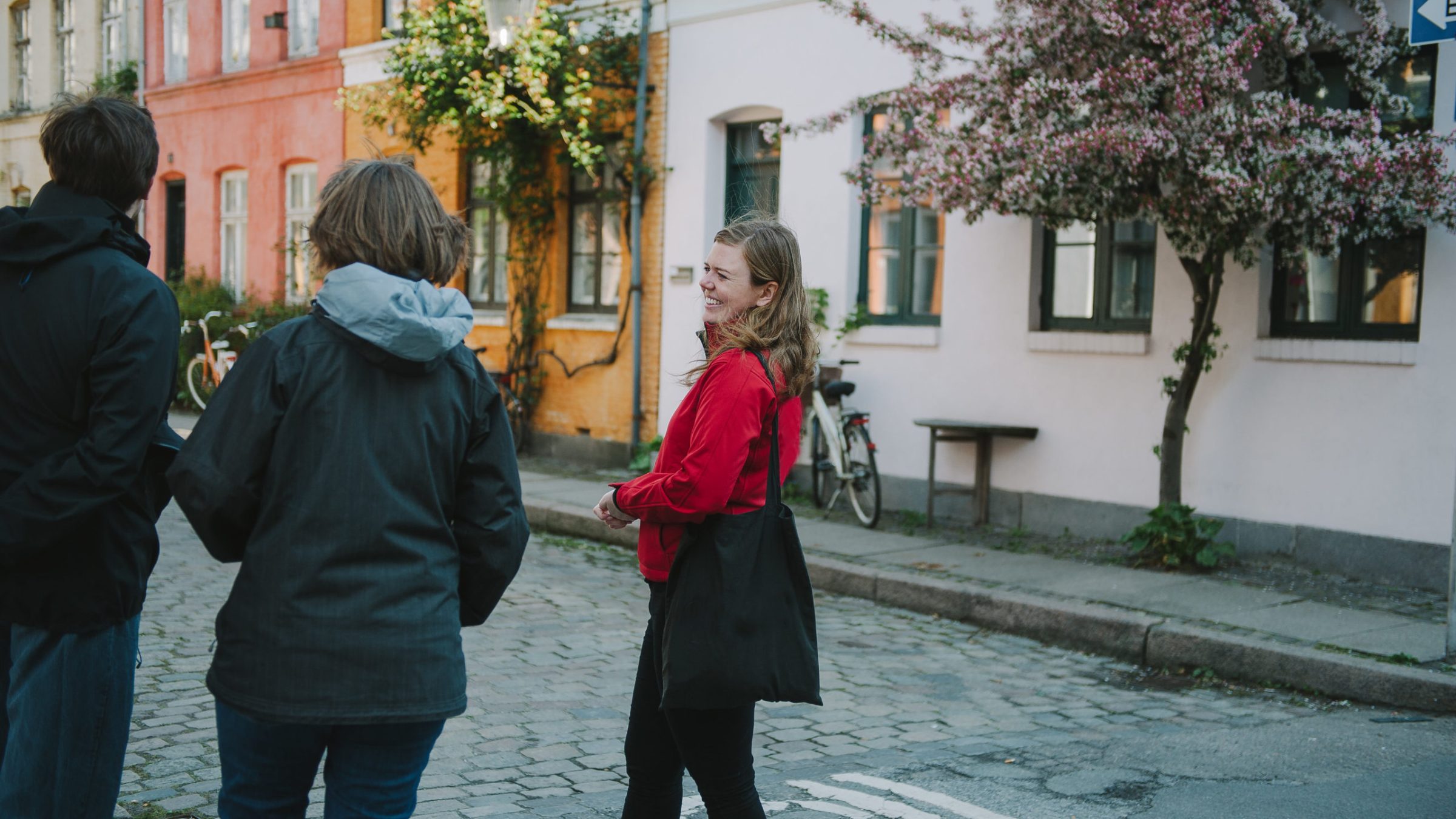 a man and a woman walking down a street